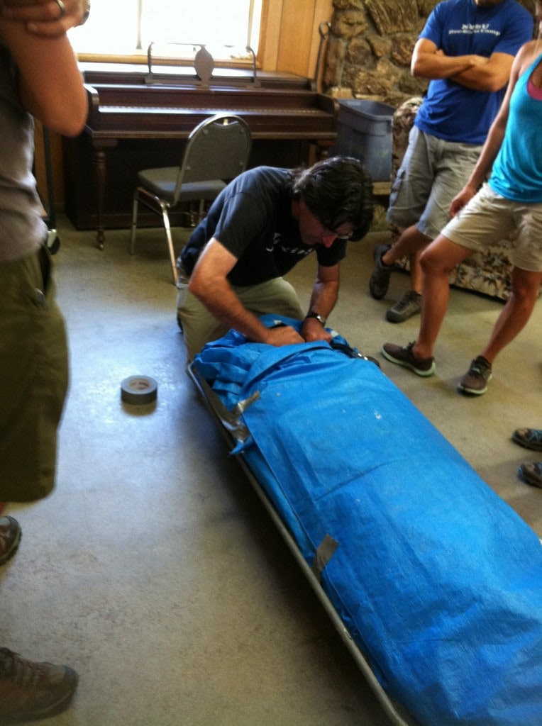 John Jackson demonstrates how to package a patient for hypothermia before transportation
